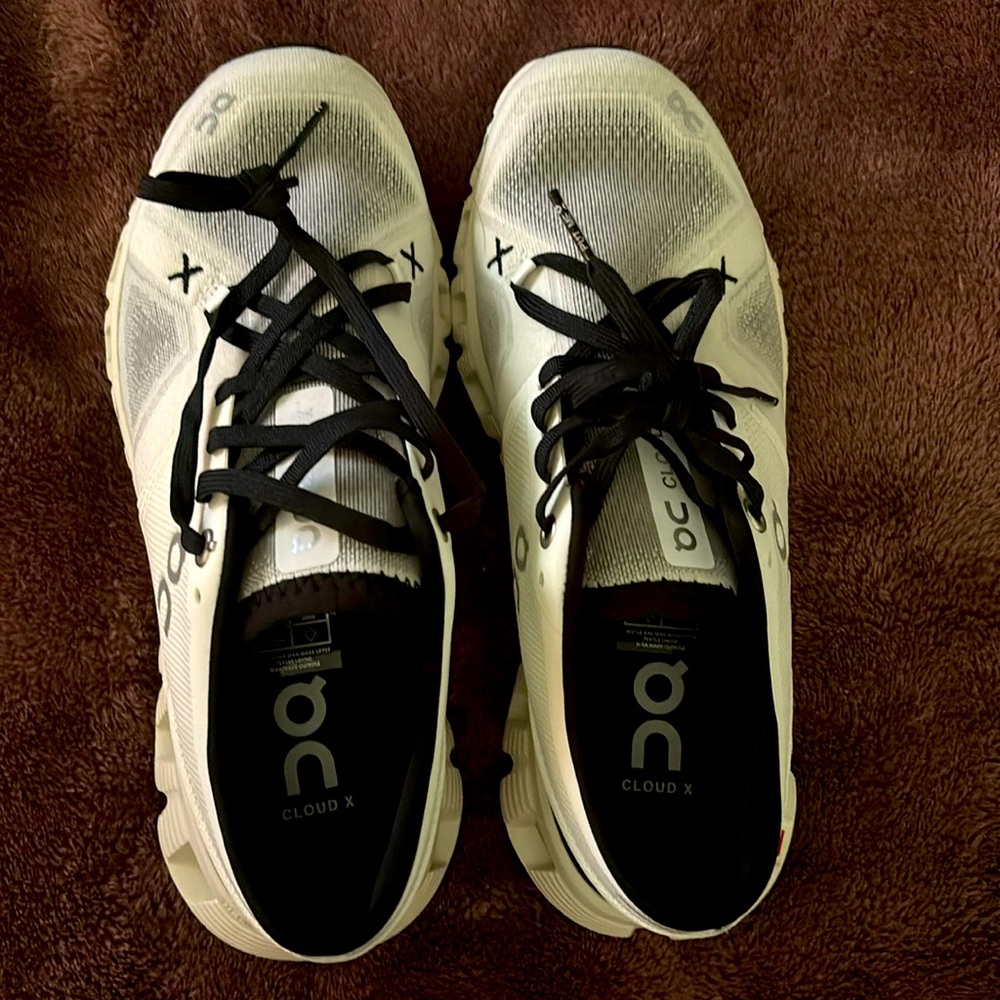 On cloud white and black shoes
